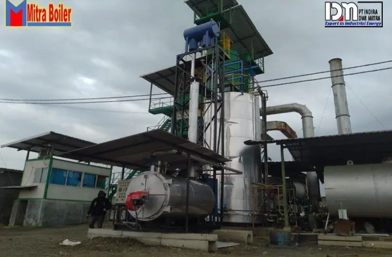 Instalasi thermal oil heater industri dengan burner, tangki thermal oil, dan sistem perpindahan panas